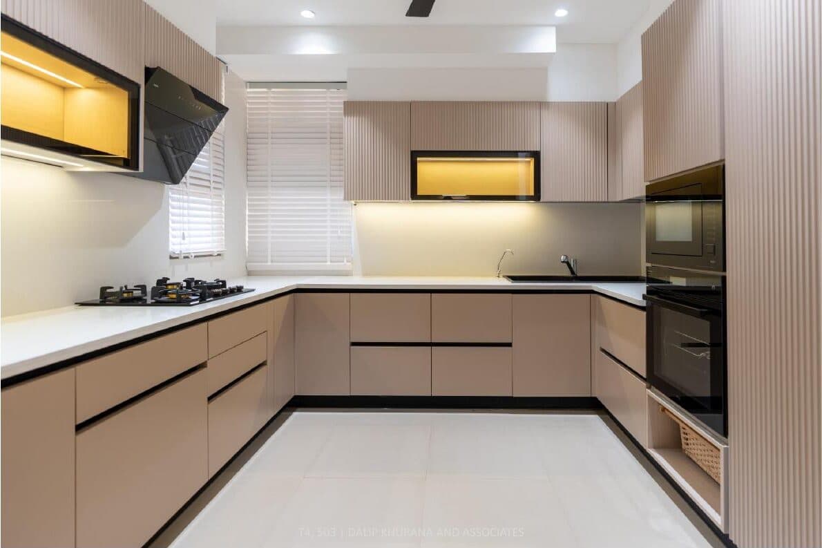 Kitchen with hand-finished cabinetry and stone counters